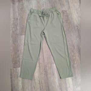 Women's Lululemon Keep Moving 7/8 high-rise pants in a Sage Green